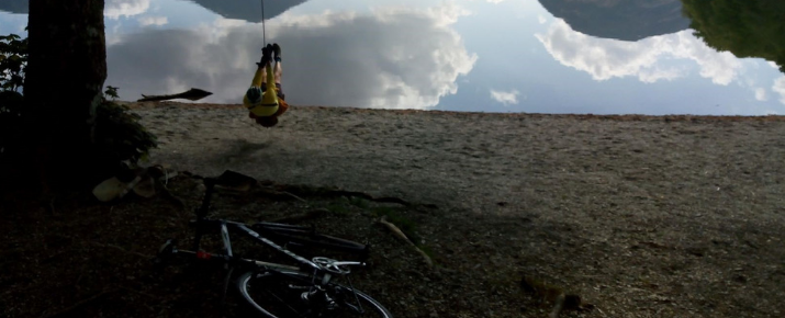 conniw on a rope swing with her ebike in the forefront