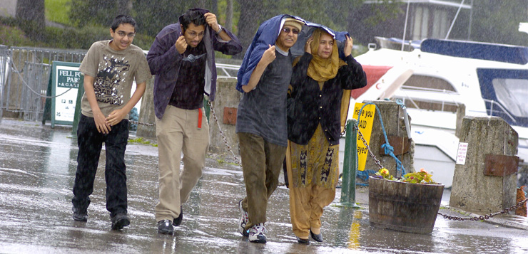Awan family in the rain copyright Charlie Hedley