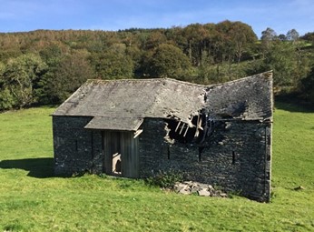 Barn before with broken roof