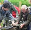 Lake District National Park Volunteers help fix a wall 