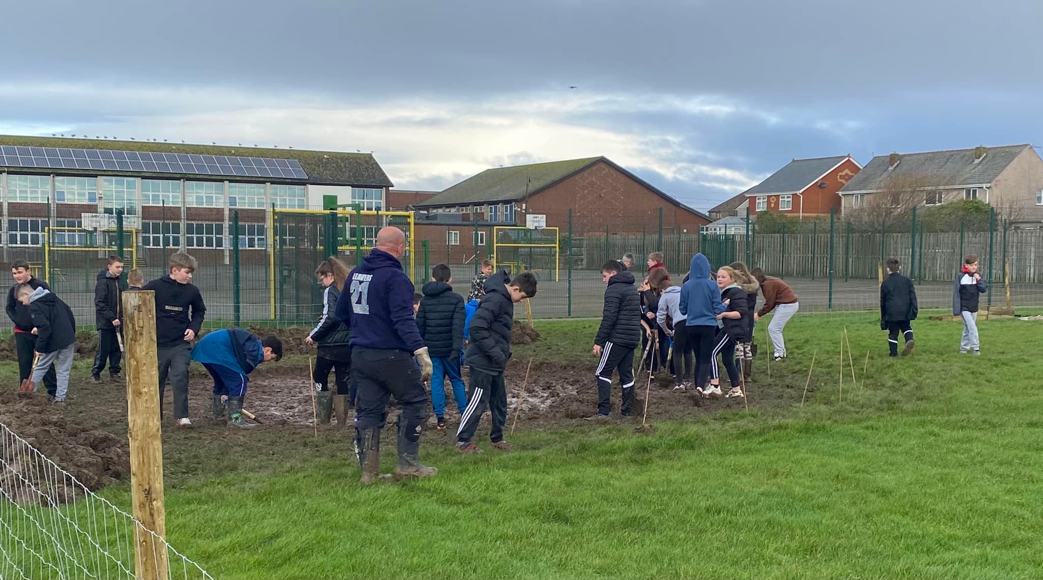 Group of children at Walney School in outdoor lesson.