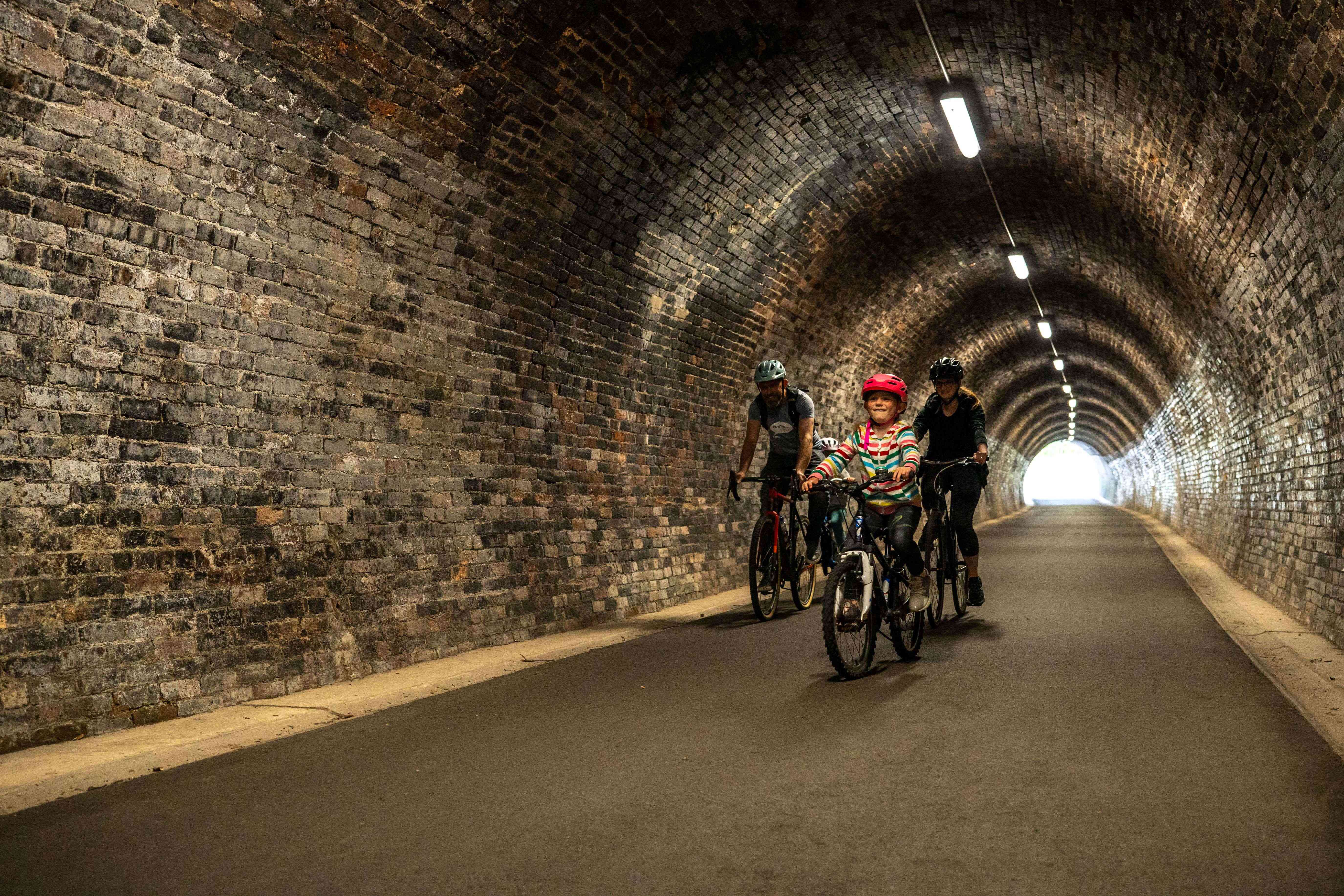 Family cycling on the Keswick to Threlkeld Trail