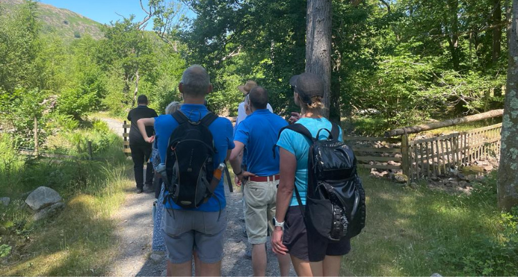 Members and staff walking together