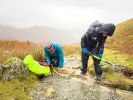 Volunteers work on a path at Easedale Tarn in the Lake District