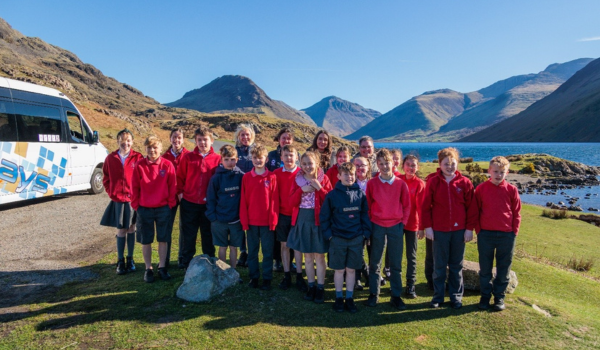 Pupils at Gosforth C of E Primary School, who were the first passengers on the bus for the 2025 season