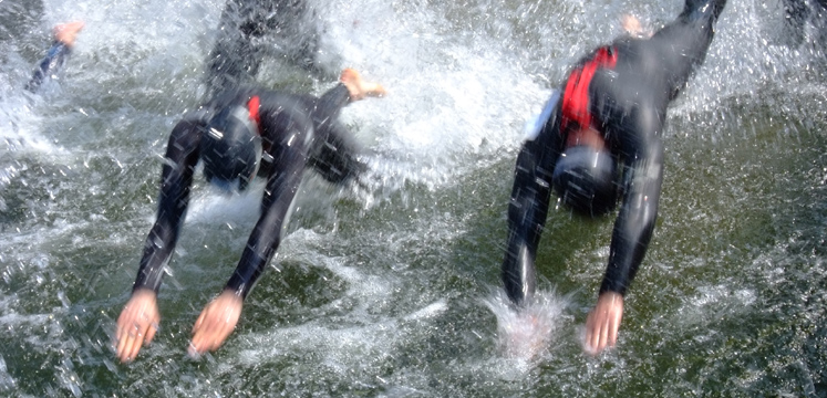 Diving in to the Great North Swim in Windermere copyright Cumbria Tourism