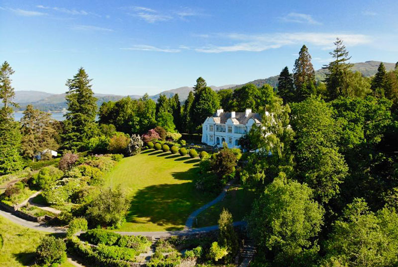 Looking down over Brockhole house and the Mawson designed gardens with views over Windermere and the Langdales in the distance.