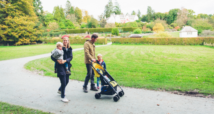 amily walking round Brockhole with a child and pram