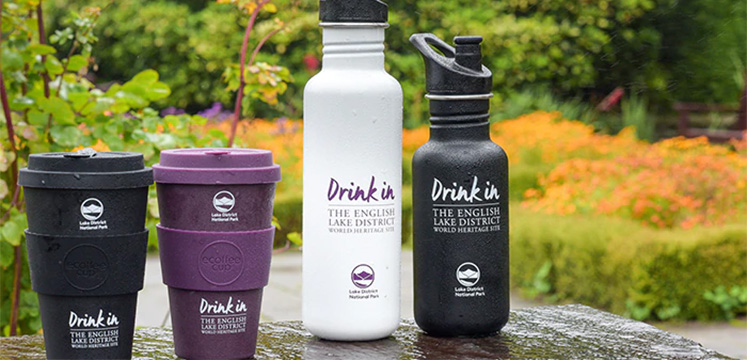 Reusable cups and water bottles with Lake District branding