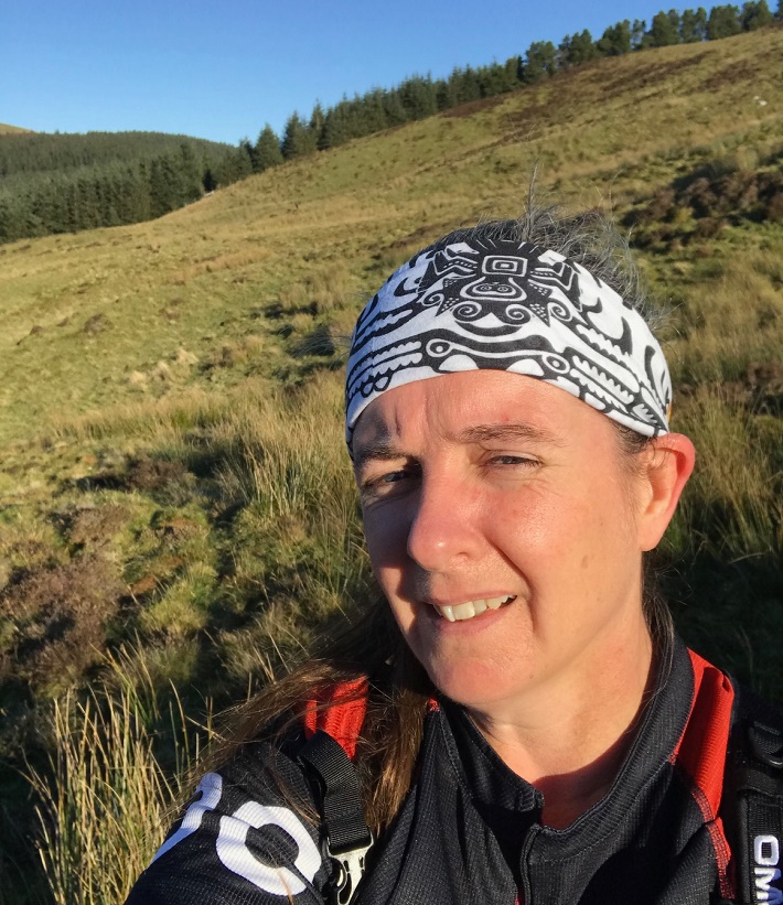 Selfie of woman orienteering in the Lake District