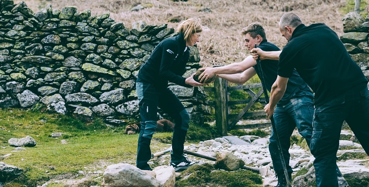 Rangers working together outdoors.