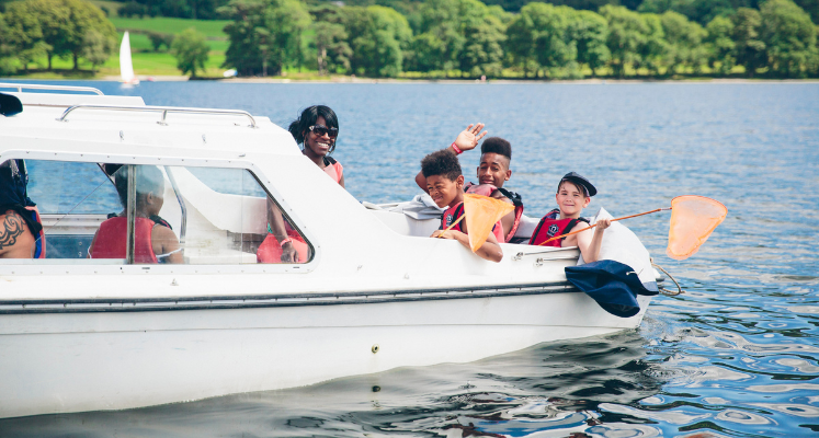 Family on a boat in the Lake District