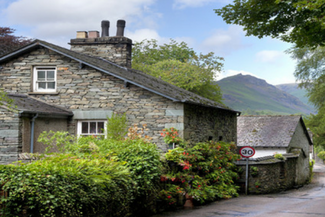 Dry stone house in a small lake district village