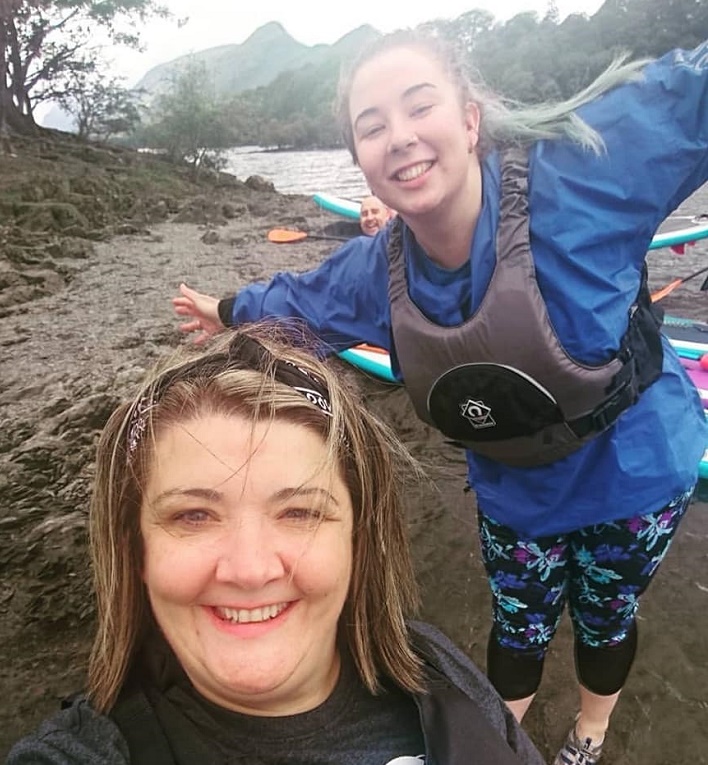 Selfie of two women wild swimming in the Lake District.