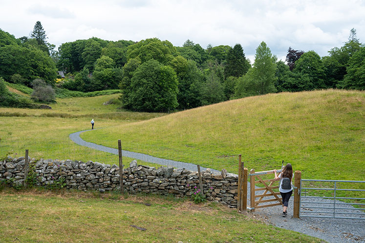 West Windermere Way - walker using the gate