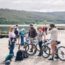 Family at Coniston on bikes.